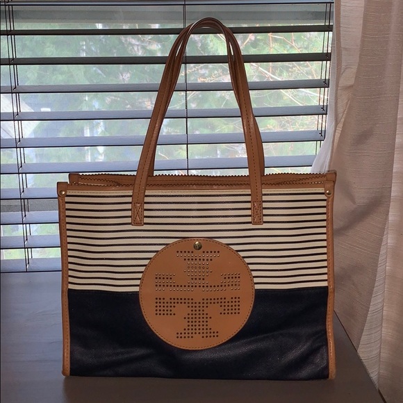 navy and tan handbag